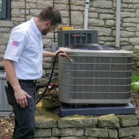 Tyson Services Technician Washing Outdoor System