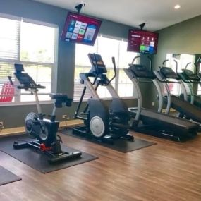 State of the art fitness center with strength equipment and cardio machines.