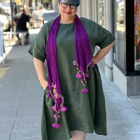 Keeping it cool in 100% linen dresses from Yuvita. Green melange is paired perfectly with hand crocheted tulip scarf in Plum.