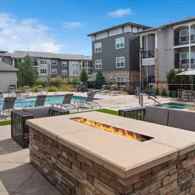 Outdoor Fireside Lounging Area with Comfortable Seating