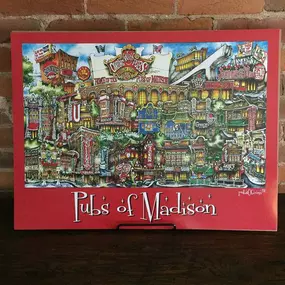 This 18” x 24” poster version of the hand painted PubsOf image depicts the iconic pubs and landmarks surrounding the University of Wisconsin-Madison including Lucky’s, Paul’s Club, Nick’s, Wando’s, Church Key, Essen Haus, Come Back In, Amy’s Cafe & Bar, Vintage, Dotty Dumpling’s Dowry, The Nitty Gritty and more! It’s the perfect holiday gift for Badgers fans, alumni, and students. Available framed or unframed.