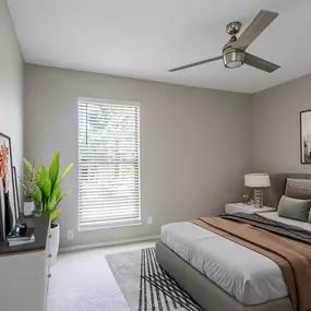 Renovated bedroom with plush grey carpeting