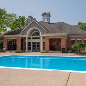 Swimming pool with a brick building