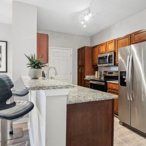 Gourmet Kitchen Featuring Stainless Steel Appliances