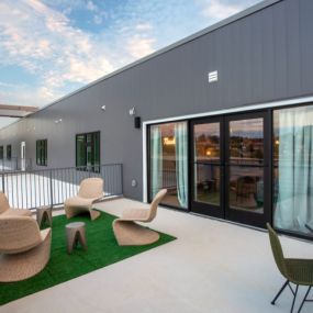 Rooftop terrace with group seating.