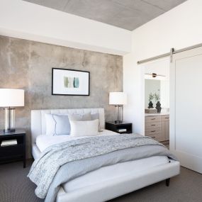 bedroom with sliding barn door