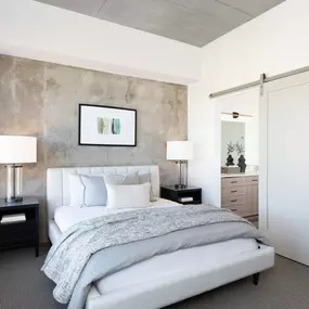 bedroom with sliding barn door