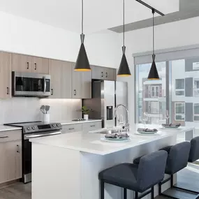 modern kitchen with island and bar seating