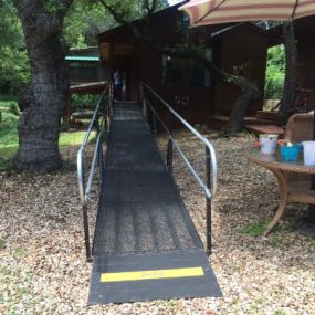 This wheelchair ramp rental installed by Anna Brown and the Amramp Austin team now provides easy access for an injured worker at his home overlooking Lake Austin, Texas.