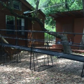 Anna Brown and the Amramp Austin, Texas team installed this wheelchair ramp rental for a log cabin home overlooking Lake Austin.