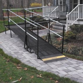 Amramp Richmond provided a wheelchair ramp for the front entrance of this home in Midlothian, VA to accommodate out-of-town guests. The homeowners and the guests were very pleased with the quality of the ramp.