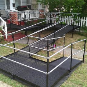 Amramp Hampton Roads was able to provide safe access for this home with a wheelchair ramp provided through the PACE program in Hampton, VA. Even in a small yard with significant rise, Amramp can provide safe access.