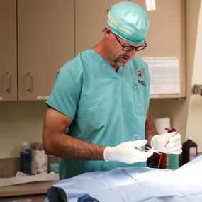 Dr. Jeremy Ley is focused and hard at work while performing a surgery.