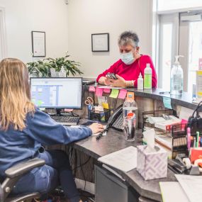 The front office team at Short Pump Animal Hospital keeps our hospital team organized and ready for daily appointments.