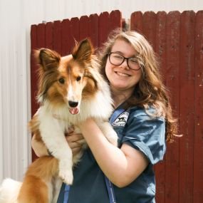 Meet Katie, a Team Member at WagMore, cuddling one of our furry campers! Our staff are all properly trained and well equipped to help make sure your pups have a fun and enriching time during their time here.