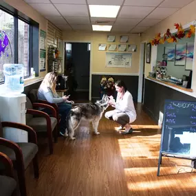 Dr. Sam Sroczyk greets one of her adorable patients!