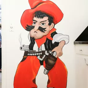 We’re Oklahoma State fans, and we have Pistol Pete in-house to prove it!