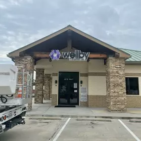 Exterior front entrance of credit union in Alvin