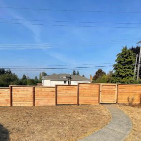 This is an example of a high-quality large cedar fence install, we are fully equipped to handle any sized job.