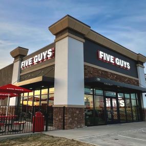 Exterior photograph of the Five Guys restaurant located at 8445 N. Beltline Road in Irving, Texas.