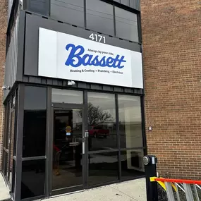 Bassett Services: Heating, Cooling, Plumbing, & Electrical store sign