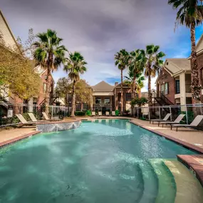 Swimming pool with palm trees