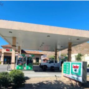 Gas station with canopy and gas pumps