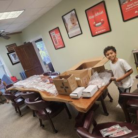 My helpers helping me get ready for back to school giveaways! Oh and ice cream break after 30 minutes of working??