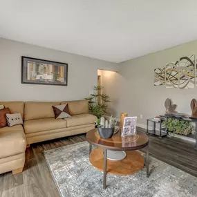 Spacious living room with leather couch