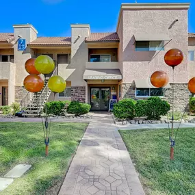 Leasing office exterior with balloons