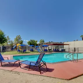swimming pool with lounge chairs