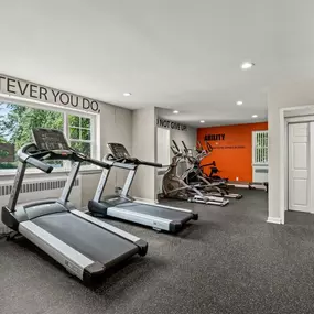 fitness center with treadmills