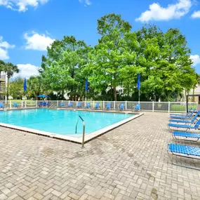 swimming pool with lounge chairs