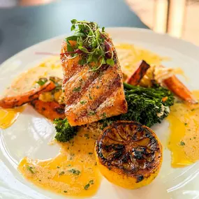 Ever-changing and seasonally focused, our menu delights in the freshest ingredients. Dive into the delicious flavors of our Grilled Scottish Salmon, a limited-time favorite that captures the essence of the season.