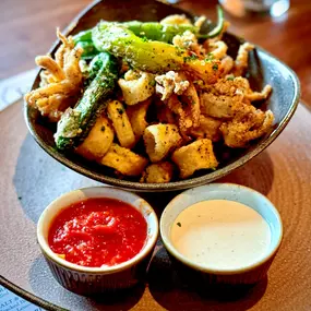 Crispy. Savory. Just the right amount of heat. Our Salt & Pepper Calamari brings the perfect balance of cracked black pepper, Maldon salt, blistered shishito peppers, and a duo of burnt lemon aioli + marinara.????✨

How do you like your calamari—classic or with a little kick?