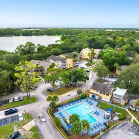 Aerial view of the community surrounded by green trees