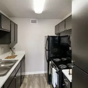 galley kitchen with appliances