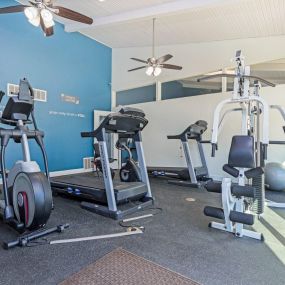 fitness center with cardio equipment