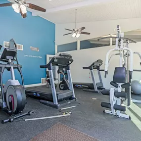 fitness center with cardio equipment