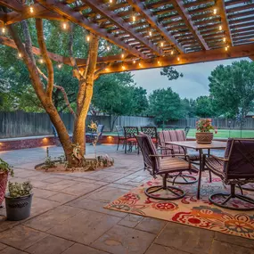 Beautiful outdoor living space including a stunning patio and pergola installation in Lubbock, TX!