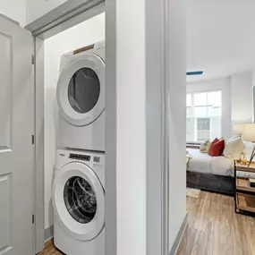 Washer and dryer at the bedroom entrance