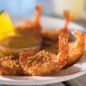 Coconut Shrimp - Served with a citrus-mustard dipping sauce.