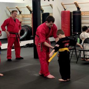 From white belts taking their first steps to advanced practitioners reaching new heights, each belt represents a journey of growth, perseverance, and the pursuit of excellence.