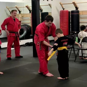 From white belts taking their first steps to advanced practitioners reaching new heights, each belt represents a journey of growth, perseverance, and the pursuit of excellence.