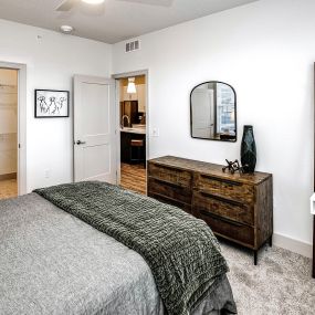 Studio, one, and two-bedroom apartment homes with stainless steel appliances, quarts countertops, designer cabinetry, large kitchens, luxury vinyl plank flooring, high vaulted ceilings, high-end lighting, in-unit washer and dryer, and energy efficient windows at Fireside at Waukee in Waukee, IA