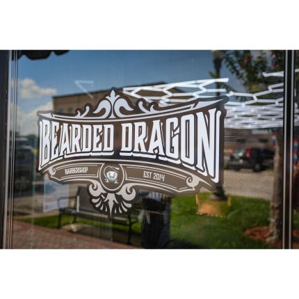 Logo de Bearded Dragon Barbershop Inc