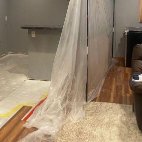 Pictured here is Trade Lake Wisconsin water damage restoration in a basement.  The wet bar water pipe froze and resulted in water damage.