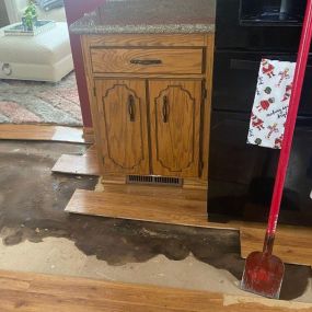 Pictured here is Siren Wisconsin water damage from a leaking refrigerator water line that caused mold to grow on the kitchen subflooring and into the basement.