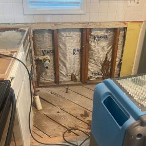 Pictured here is Siren Wisconsin water damage from a frozen kitchen water pipe.  As you can see in this picture, we replaced the frozen water pipe, and we are in the process of drying out the kitchen area.