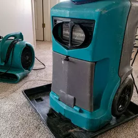 Pictured here is Luck Wisconsin water damage clean-up.  In this picture, you can see some of our commercial-grade equipment.  Water needs to be removed within 24 to 48 hours to prevent mold growth.